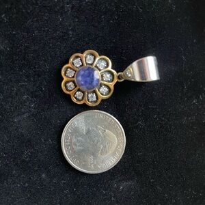 Elegant Gold and Silver Flower Pendant